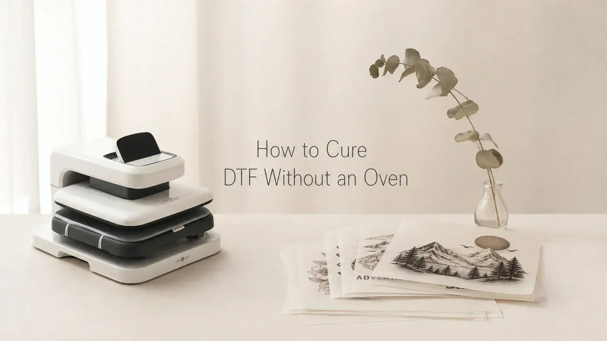 DTF transfer sheet curing on a heat press with parchment paper and craft tools on a wooden worktable