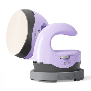 Mini heat press machine on a white background