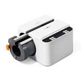 White tumbler heat press with a black cylindrical component on a white background